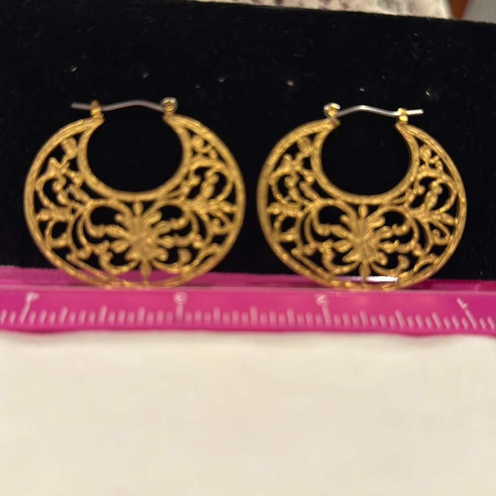 Gold colored earrings